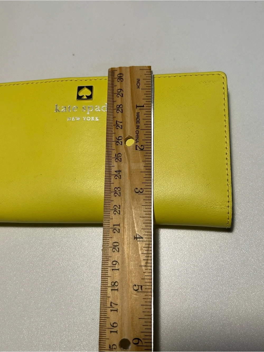 kate spade Yellow Leather Slim Bifold Wallet